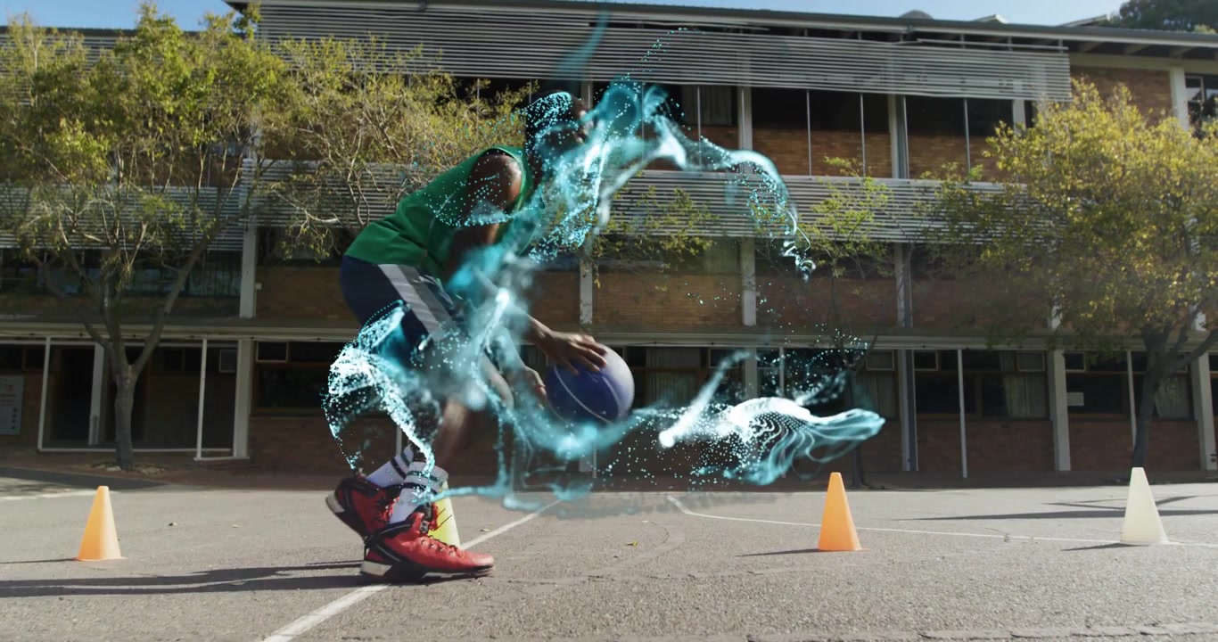 Adult male athlete guiding basketball around yellow cone and fueling digital swirl in fitness drill