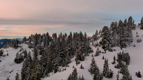 Snowy-Mountain-Peaks,-Dramatic,-Colorful-Sunset-Sky