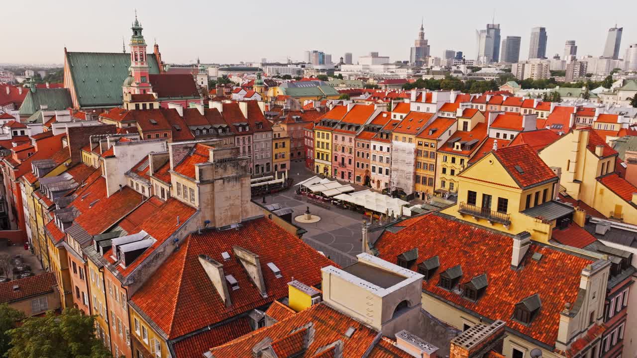Aerial establishing of Warsaw Old Town square evokes hybrid war tensions