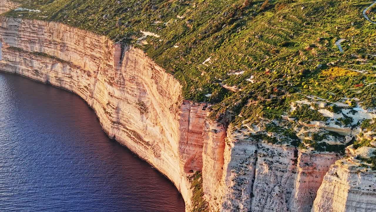 Cliffs and shoreline view of Malta during daytime