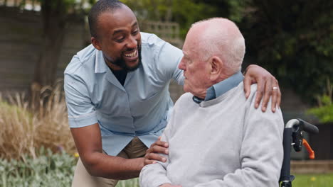 caregiver assisting elderly man in wheelchair