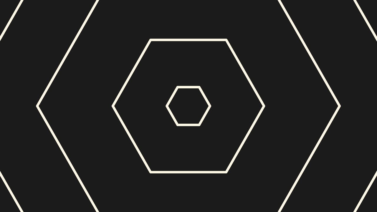 A black and white geometric design featuring a central hexagon made up of smaller hexagons in a circular arrangement. Symmetrical and visually striking in its monochrome simplicity