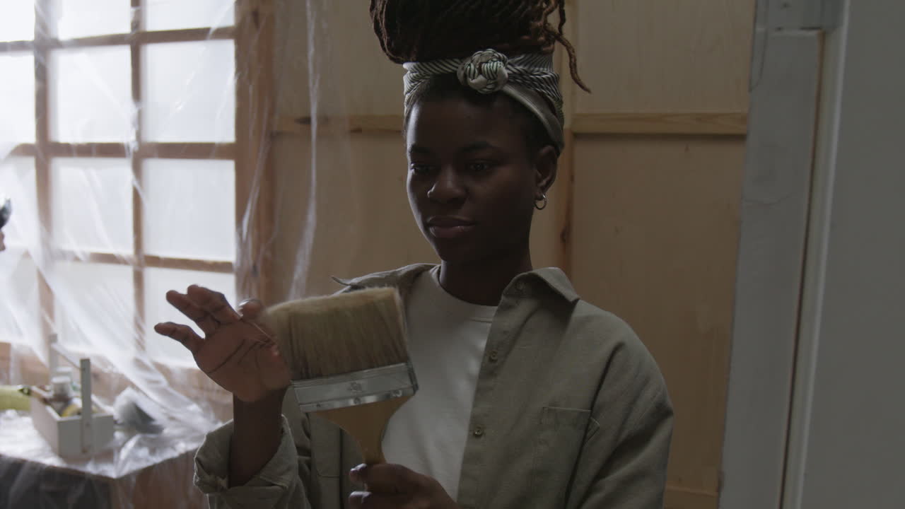 Woman with Paintbrush