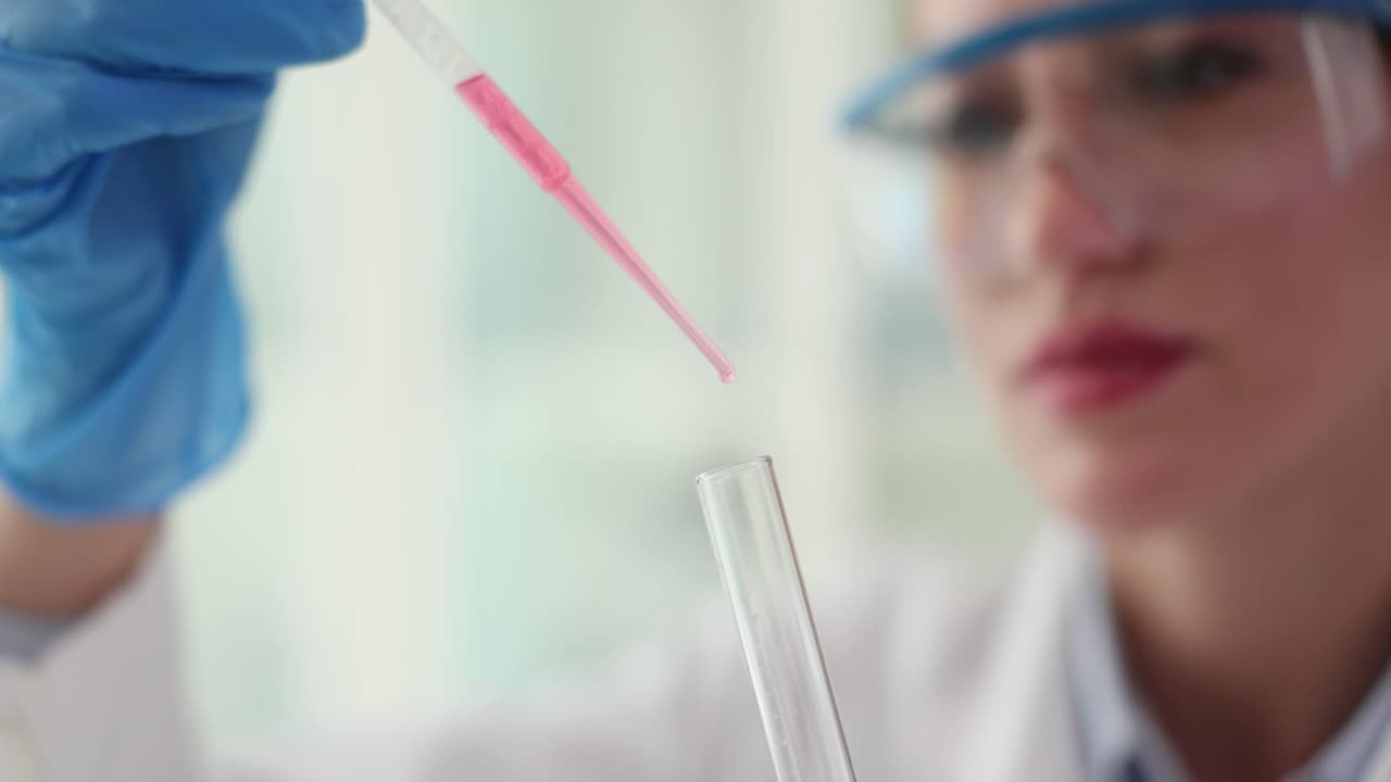 Scientist conducting a chemical experiment in a laboratory