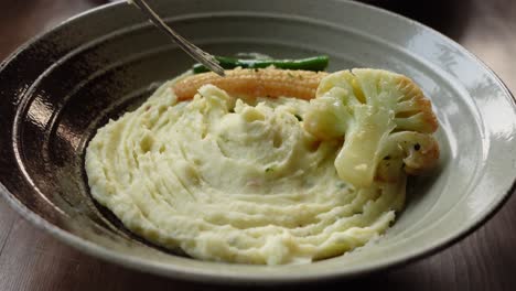 creamy mashed potatoes with roasted cauliflower and green beans