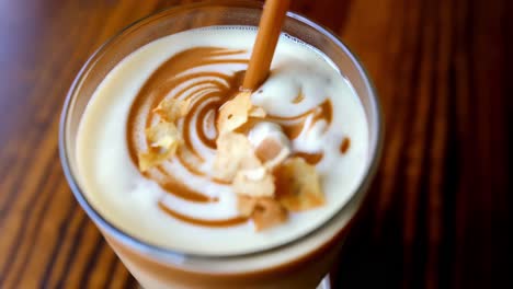 iced coffee with whipped cream and caramel toppings