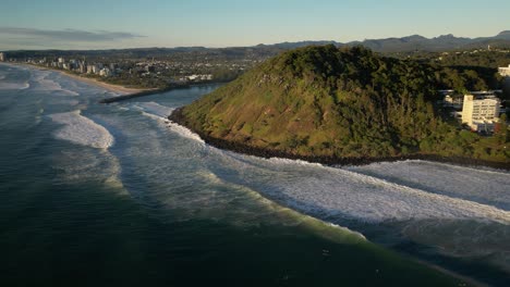 Right-to-left-wide-aerial-over-Burleigh-Heads-National-park,-Gold-Coast,-Australia