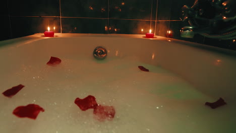 foam and flower petals in a bathtub