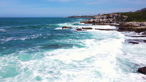 Aerial-over-jagged-Hermanus-coastline-revealing-natural-coastal-beauty