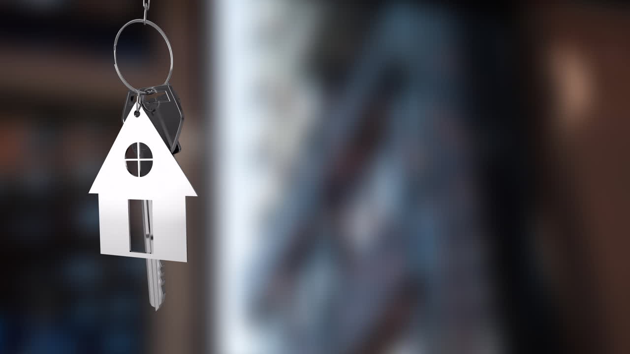 House-shaped keychain animation over blurred background