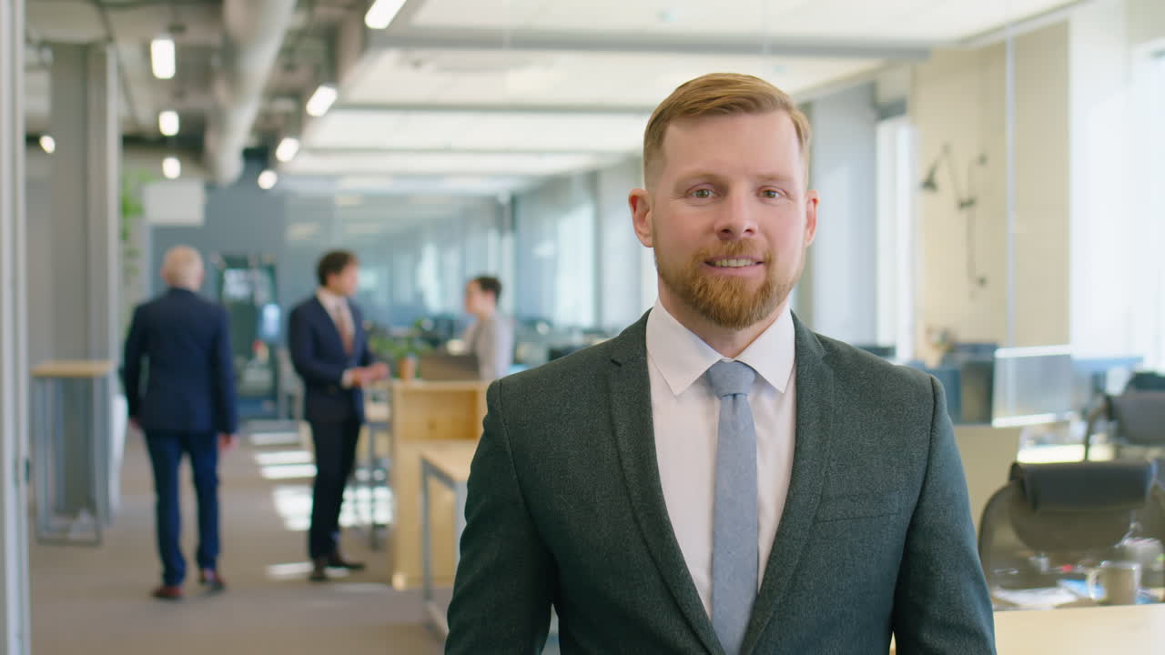 Portrait of Cheerful Businessman in Office