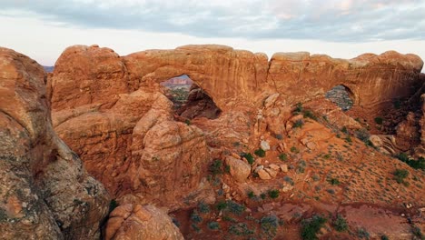 tower arch in arches national park in utah, united states - aerial drone shot