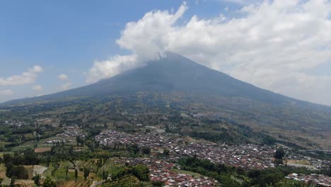 indonesian village and mount sumbing, aerial drone view