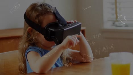 animation of mathematical drawings and equations over toddler wearing vr headset