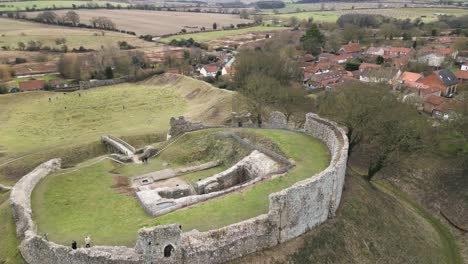 reversing rotating drone shot bailey gate at castle acre norfolk