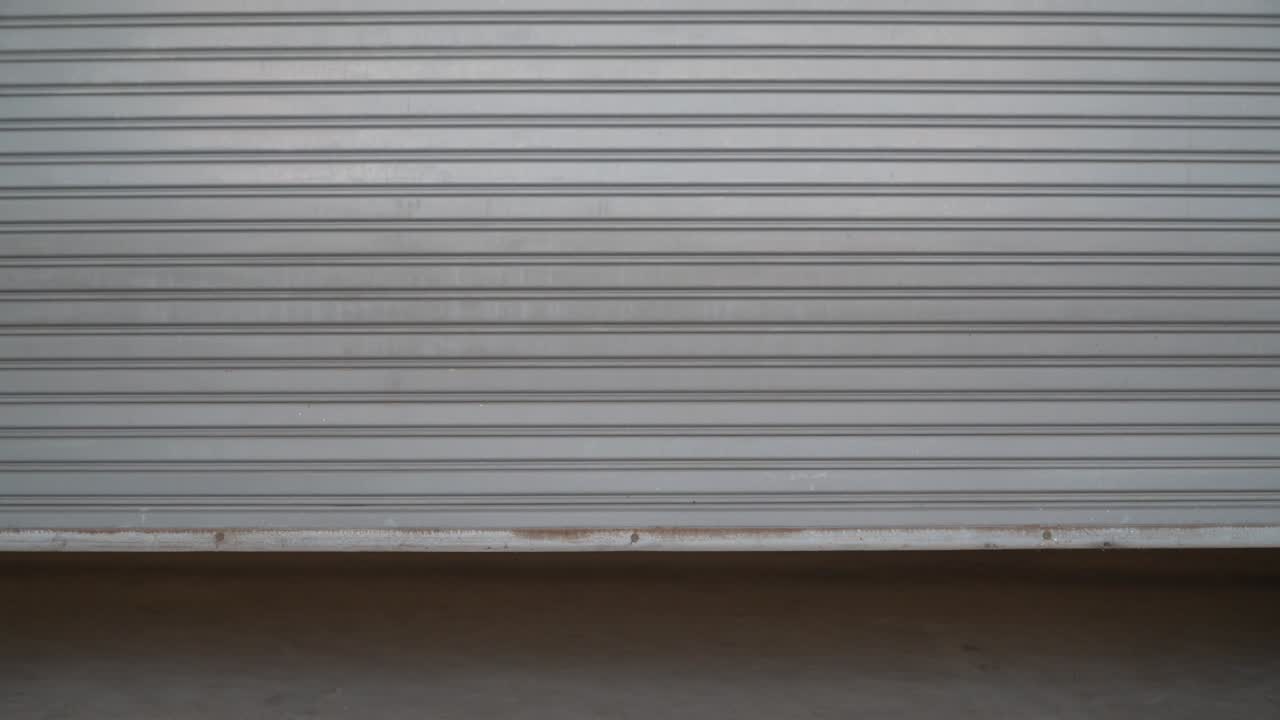 background of the sliding and dirty steel sliding door is closed.