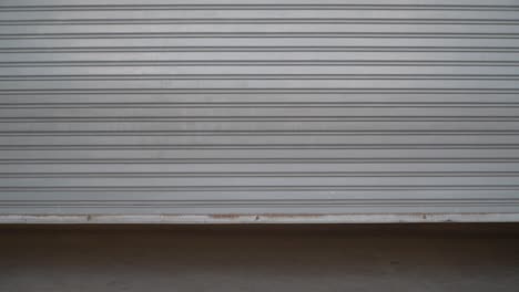 background of the sliding and dirty steel sliding door is closed.