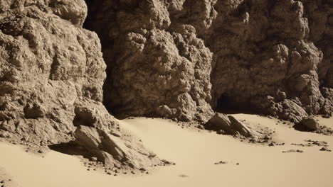 a view of a desert canyon with rock formations and cliffs