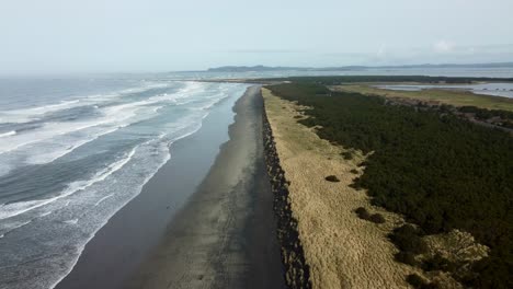 us, oregon, astoria, fort stevens, 2025-03-21 - drone view of the northwest tip of oregon where the columbia river meets the pacific ocean. fort stevens state park, jetty, and washington.