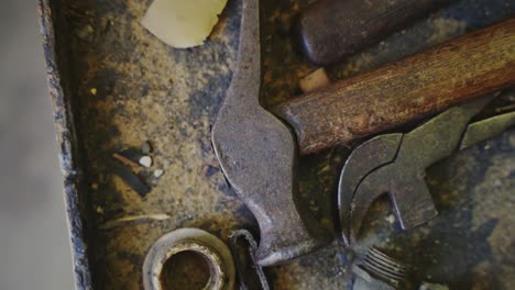 Old-cobbler's-hammer-sitting-on-a-table