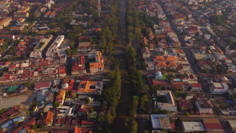 siem reap cityscape alongside siem reap river, drone shot