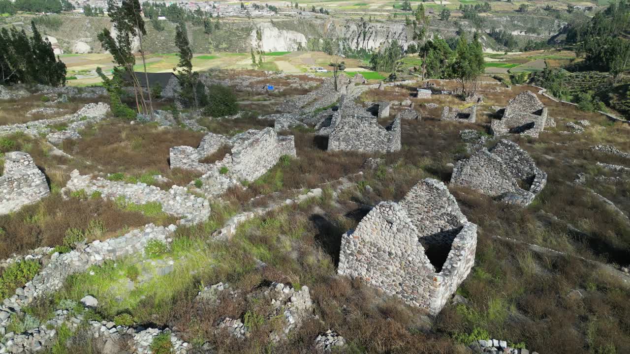 Aerial view of old, abandoned cemetery of Uyo Uyo, valley in Peru