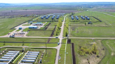 gas reservoirs surrounded by meadows upper view