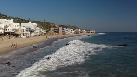 Aerial-drone-shot-over-real-estate-properties-in-Carbon-Beach-in-Malibu-in-California,-USA-at-daytime