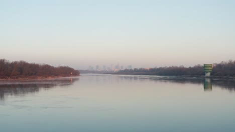 light mist over the vistula river in warsaw during sunrise