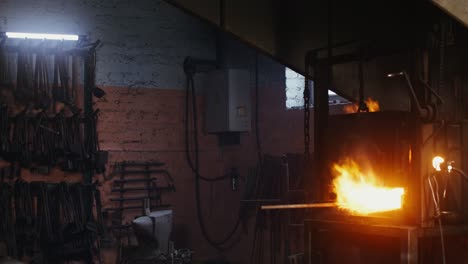 blacksmith's workshop with a blazing forge