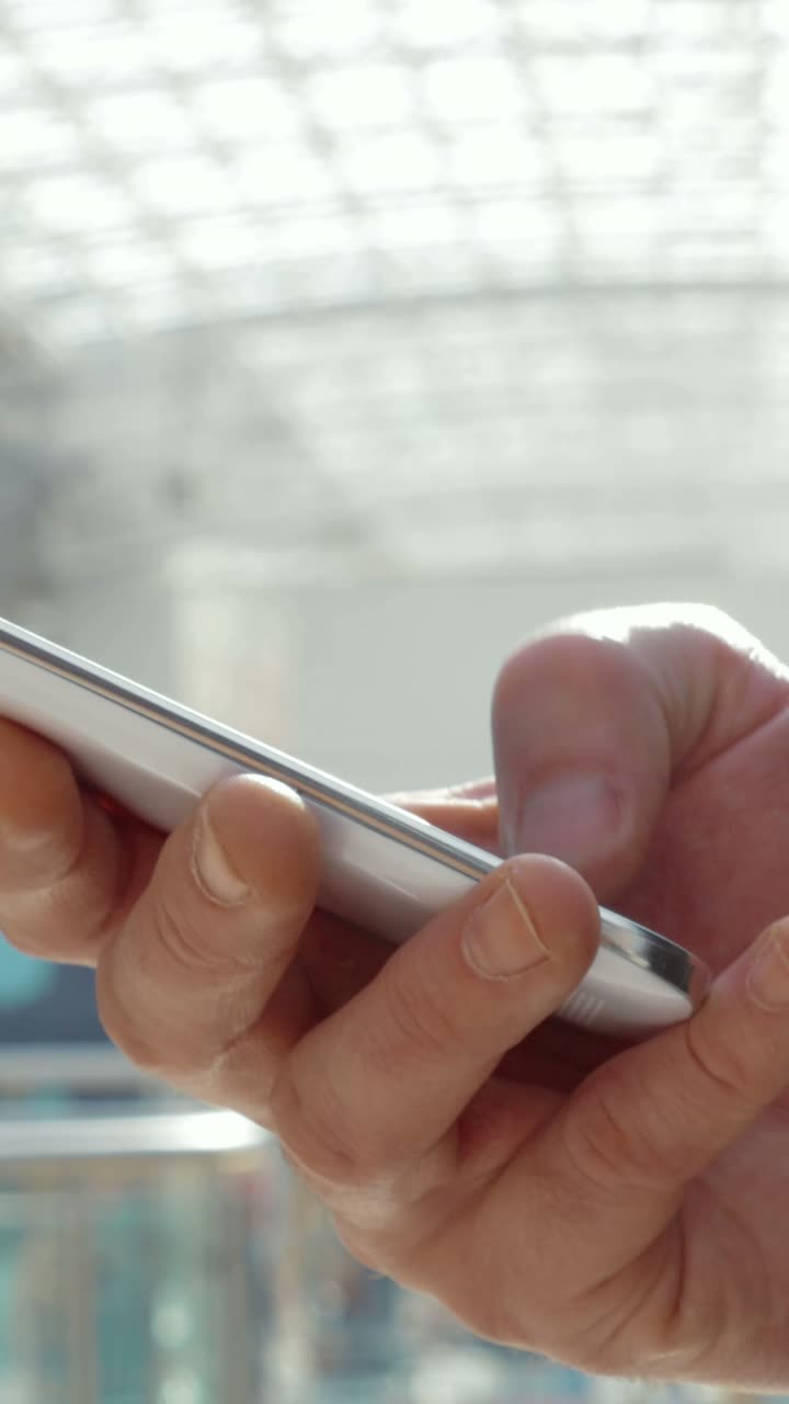 Person Holding Mobile Phone