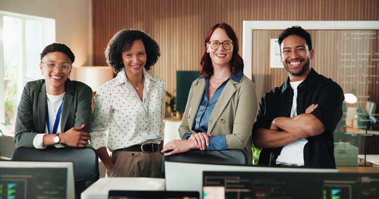 Diverse Team of Professionals Smiling in Modern Office