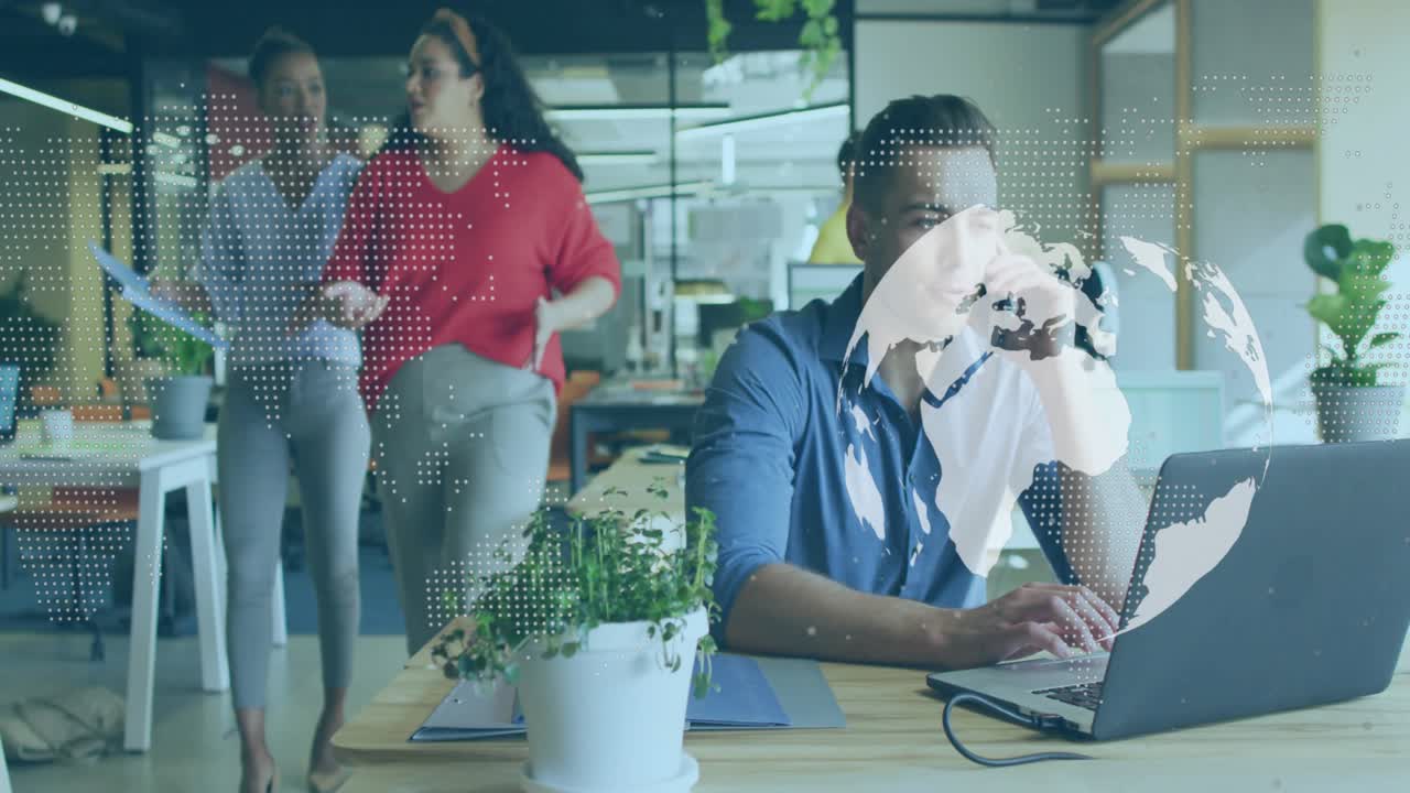 Male worker pausing phone call and searching after peer pointing as map overlay pulses in office