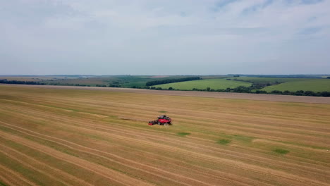 grain harvest. agricultural machinery for harvesting grain in action. aerial view.