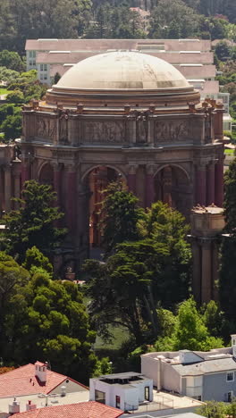 vertical drone shot of palace of fine arts, iconic landmark of san francisco, california usa