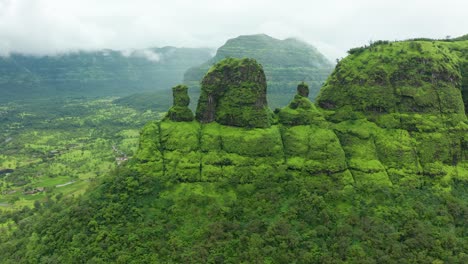 Sideways-flying-across-the-peaks-of-the-Western-Ghat-mountains-during-the-green-season-of-the-monsoon