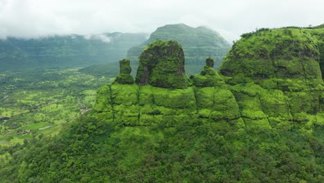 sideways flying across the peaks of the western ghat mountains during the green season of the monsoon