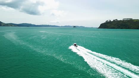 Boat-driving-through-islands-along-the-coastline