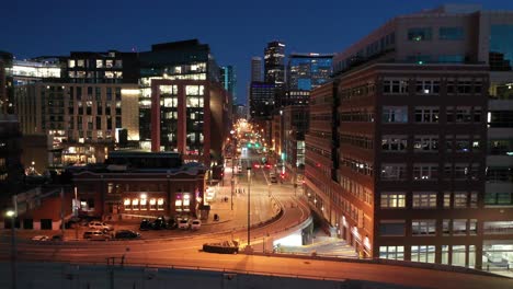 a night time shot of a denver street on a busy night