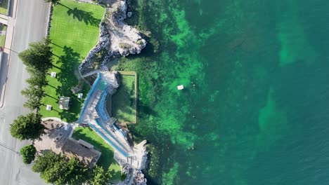 Top-down-drone-shot-of-ocean-pool-on-coast-of-Edithburgh-Tidal-Pool-on-coast-of-Edithburgh,-South-Australia