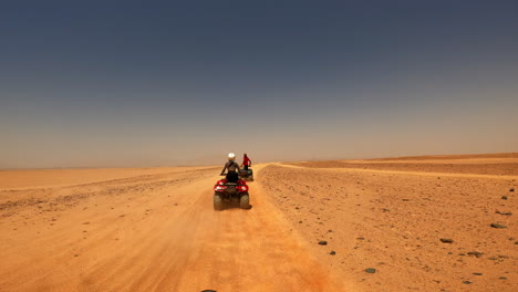 off-road quad bikes safari in a clean desert in egypt near hurghada, horizon view