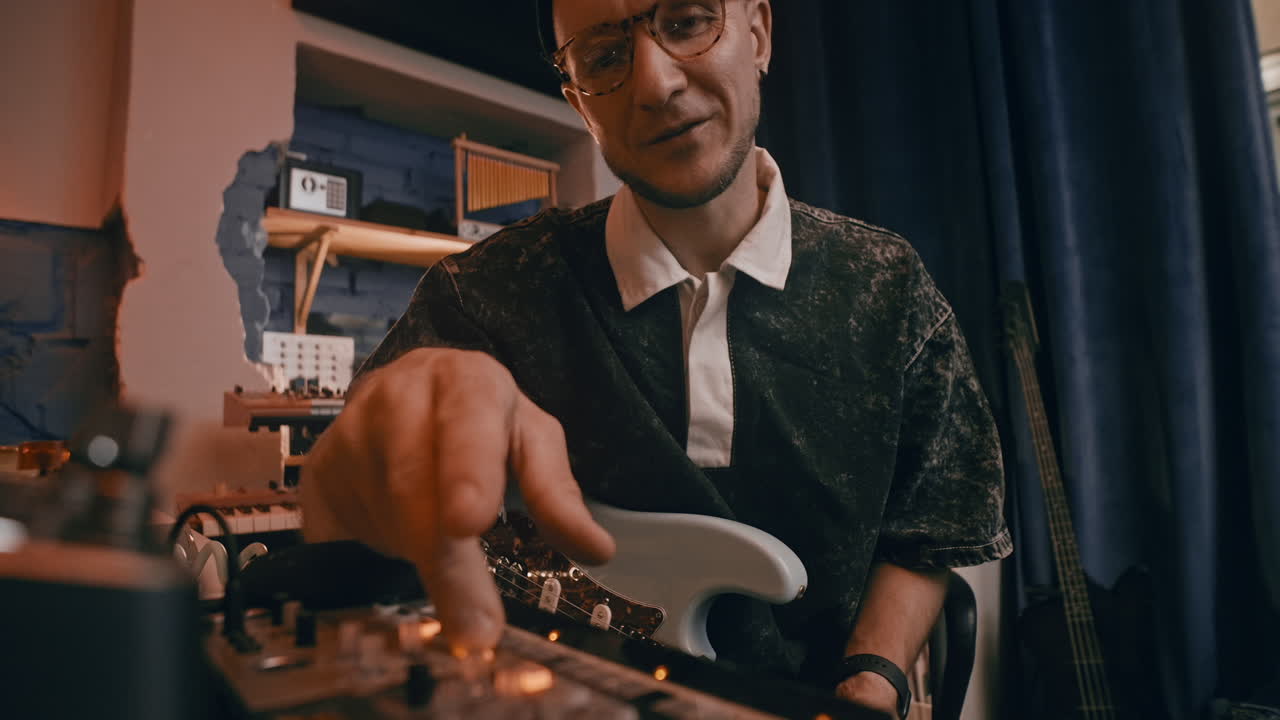 Musician working in recording studio