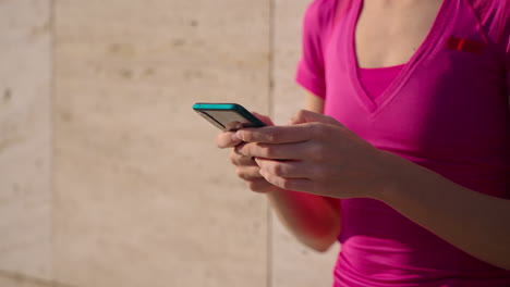 woman using a phone outdoors