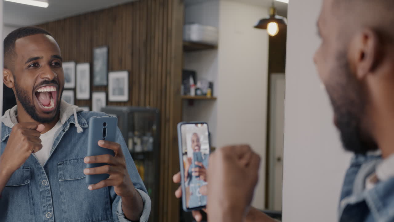 Man Video Calling with Happy Expression in Barber Shop