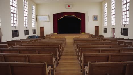 Historic-Toyosato-Elementary-School-Auditorium,-Tilt-Reveal-Shot-4k