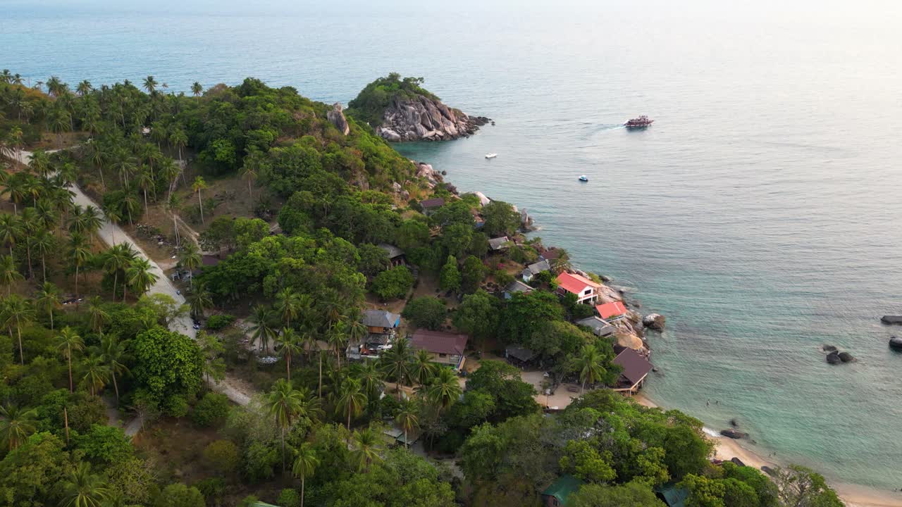 Stunning sunset scenery at tropical island beach - aerial drone view