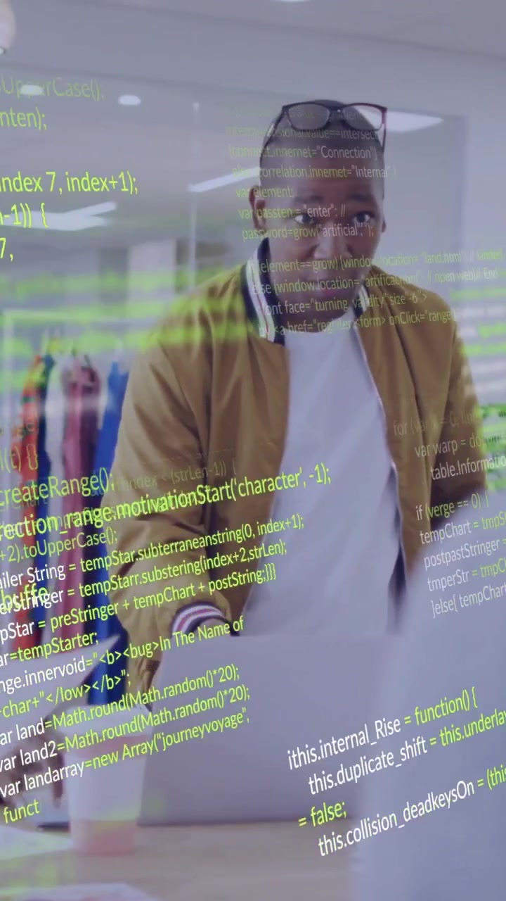 Diverse team collaborating in office with green coding animation overlay