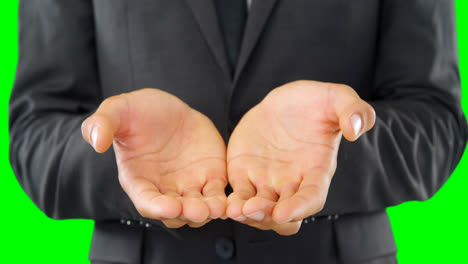 businessman pretending to hold an invisible object 4k