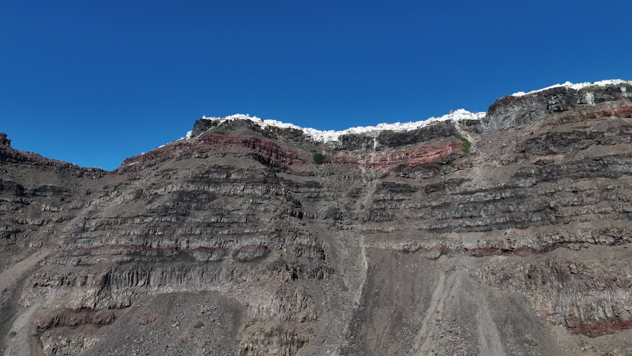 cliffs of Santorini, Greece, white-washed town perched high on a volcanic cliff in the Mediterranean sea