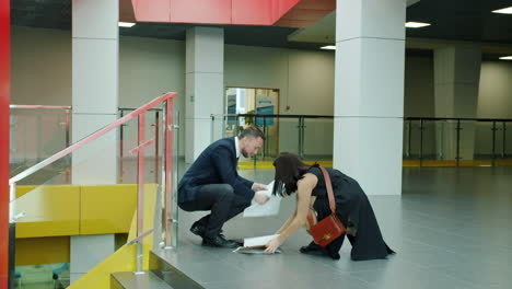 business colleagues helping each other